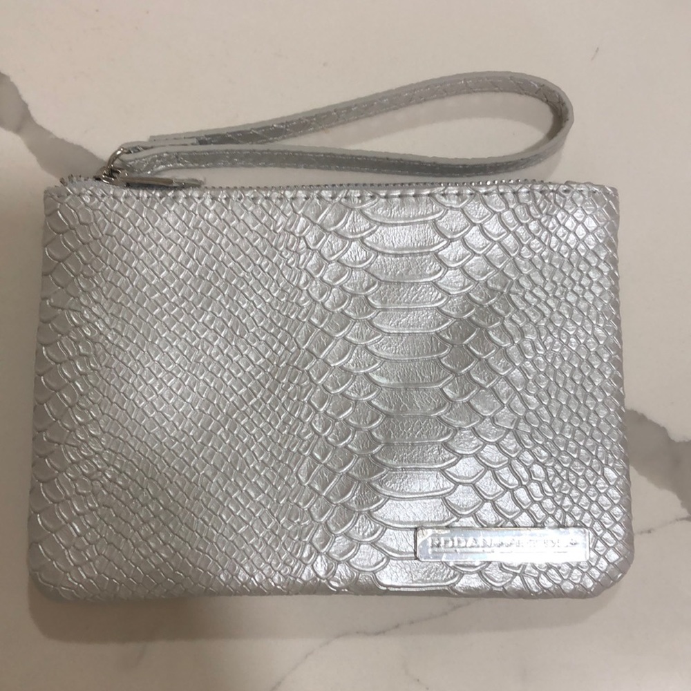 Silver snake skin clutch